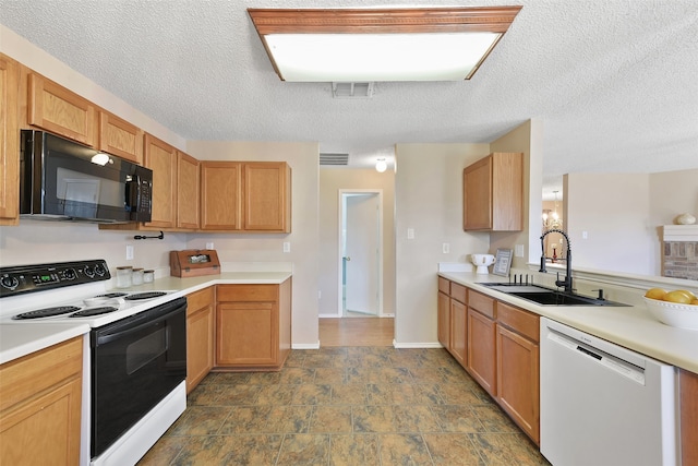 kitchen featuring electric stove, sink, a textured ceiling, and dishwasher