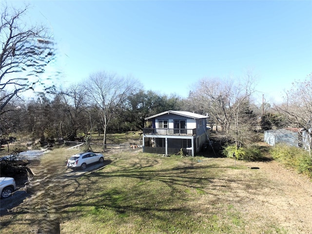 view of yard with a wooden deck