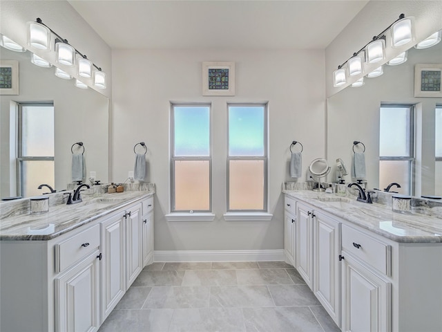 bathroom featuring tile patterned floors and vanity