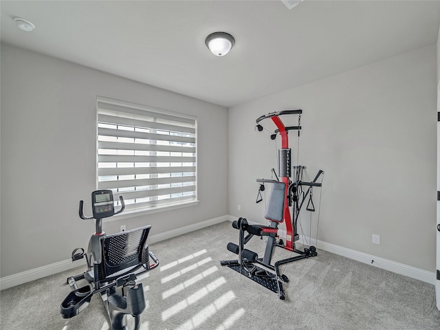 workout area with light colored carpet