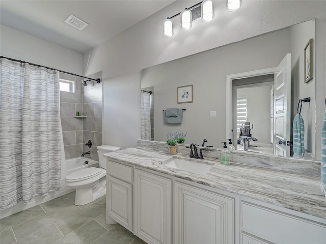 full bathroom with toilet, vanity, tile patterned floors, and shower / bath combo with shower curtain