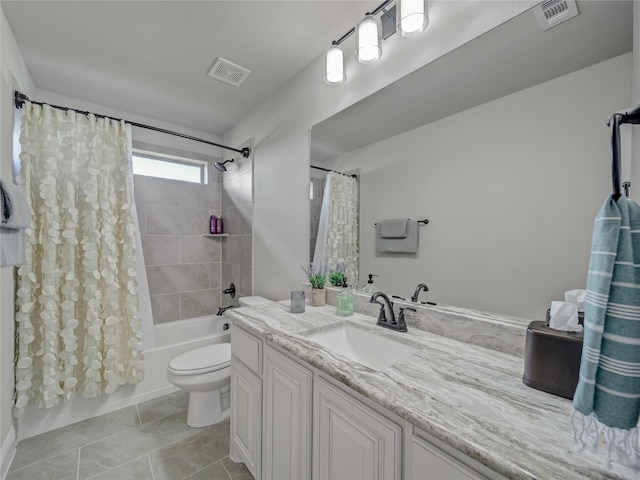 full bathroom featuring toilet, tile patterned floors, shower / bath combo, and vanity