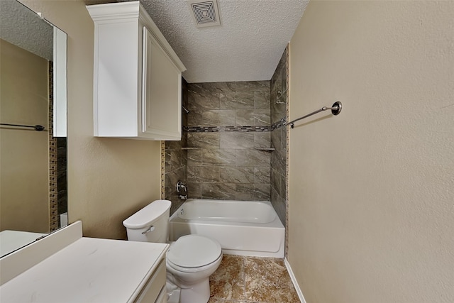 full bathroom with toilet, vanity, tiled shower / bath combo, and a textured ceiling