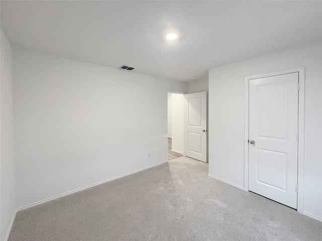 unfurnished bedroom with light carpet