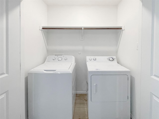 laundry room with washer and dryer