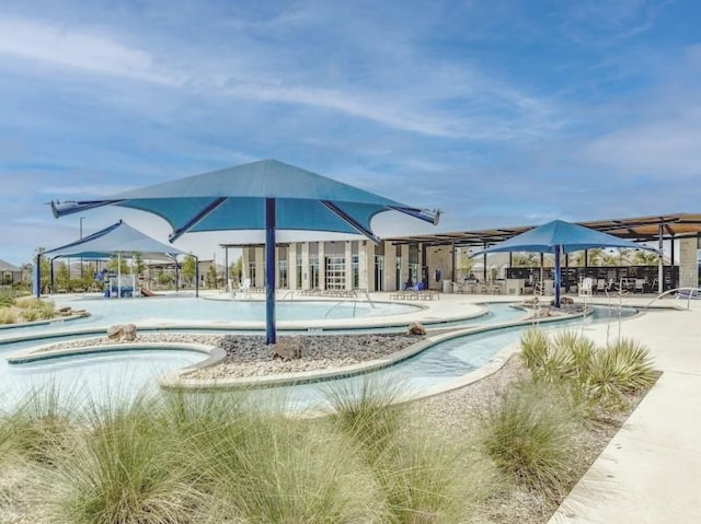 view of swimming pool featuring a patio