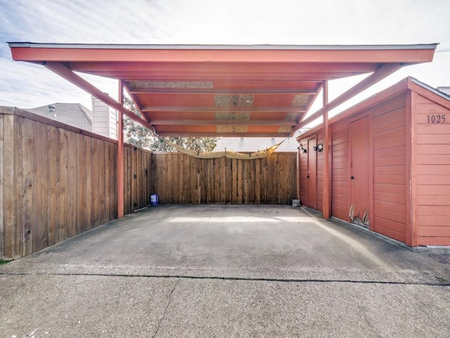 view of patio / terrace with a carport