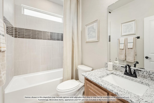 full bathroom featuring toilet, vanity, and shower / tub combo with curtain