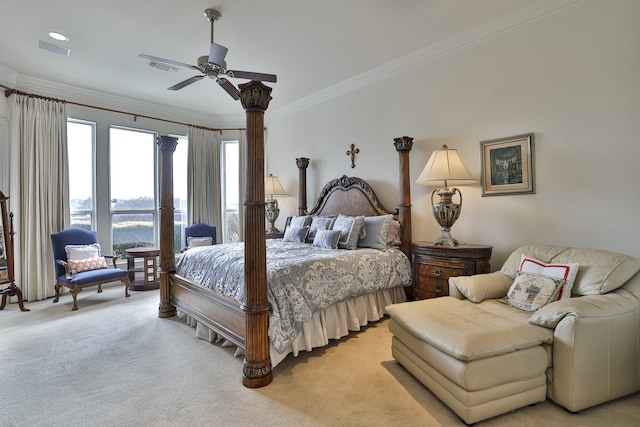 carpeted bedroom with ornamental molding, a water view, and ceiling fan