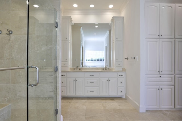 6601 Oak Hill Ct, Fort Worth, TX 76132 - bathroom featuring crown molding, a shower stall, double vanity, baseboards, and recessed lighting