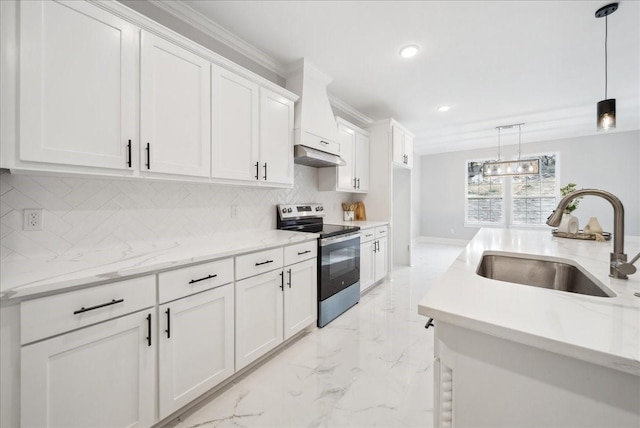 kitchen featuring stainless steel range with electric stovetop, white cabinets, and sink