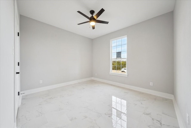 unfurnished room with ceiling fan