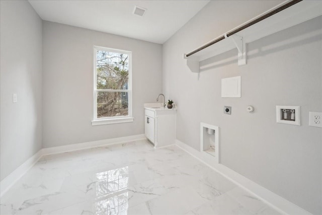 washroom with hookup for a washing machine, sink, hookup for an electric dryer, and hookup for a gas dryer