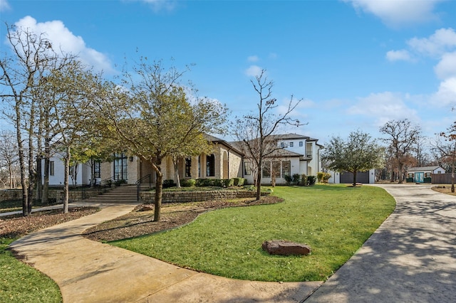 view of front of property with a front lawn