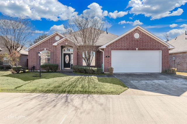 view of front of home featuring a garage and a front yard