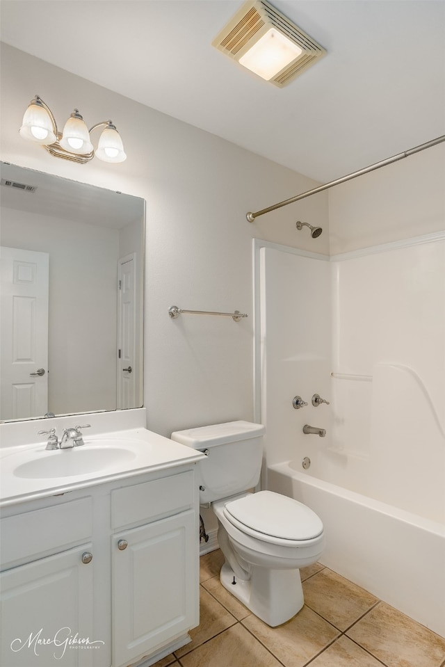 full bathroom featuring shower / bath combination, tile patterned floors, vanity, and toilet