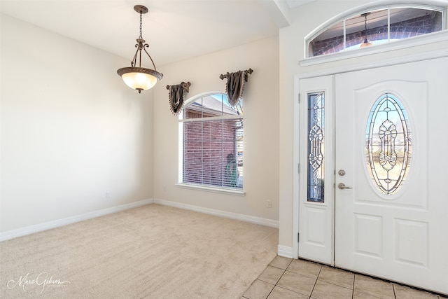 foyer with light tile patterned floors