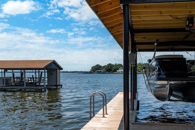 dock area with a water view