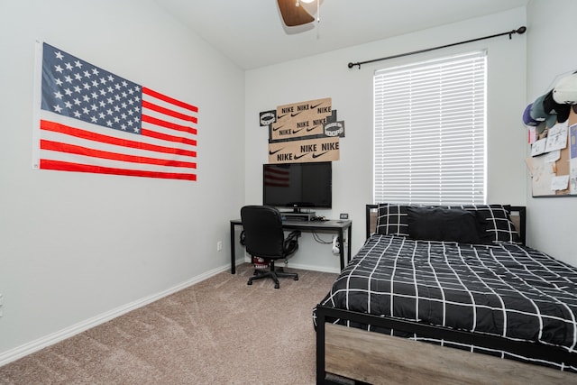 carpeted bedroom featuring ceiling fan