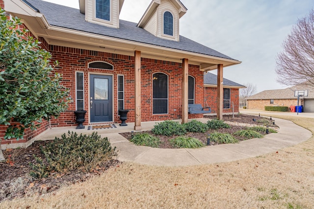 property entrance featuring covered porch