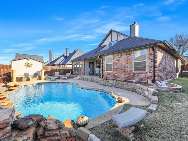 view of pool featuring a patio