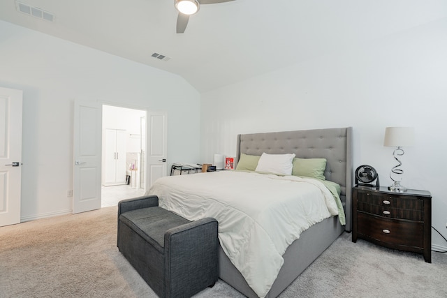 carpeted bedroom featuring lofted ceiling and ceiling fan