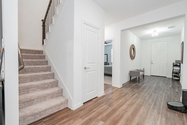 foyer with light hardwood / wood-style floors