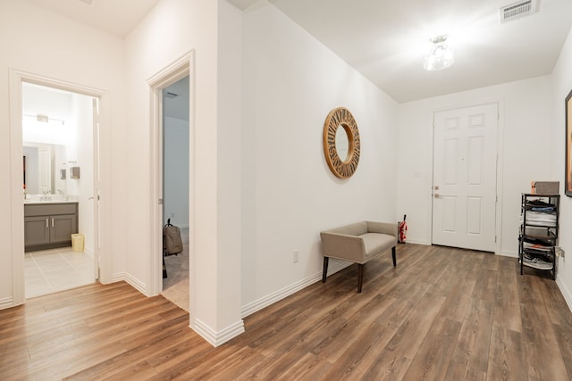 corridor featuring dark hardwood / wood-style floors