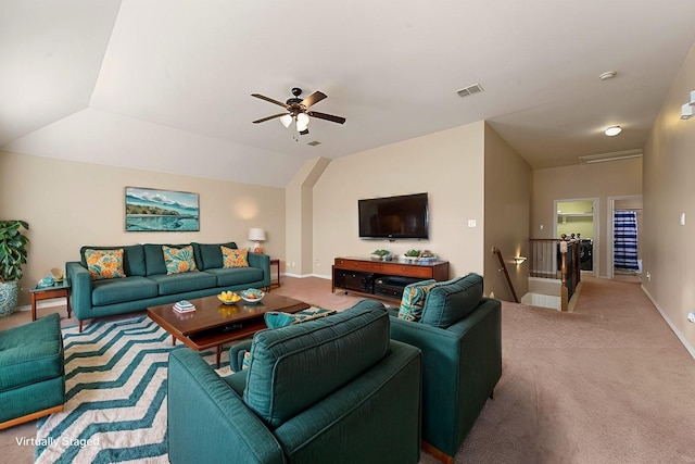 living room with carpet floors, lofted ceiling, and ceiling fan