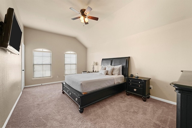 carpeted bedroom featuring ceiling fan and lofted ceiling