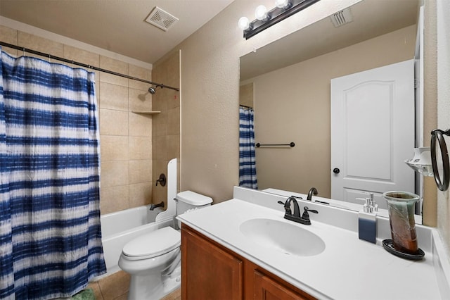 full bathroom featuring tile patterned floors, toilet, vanity, and shower / bath combo