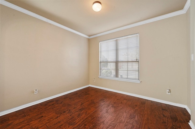 unfurnished room with ornamental molding and hardwood / wood-style floors