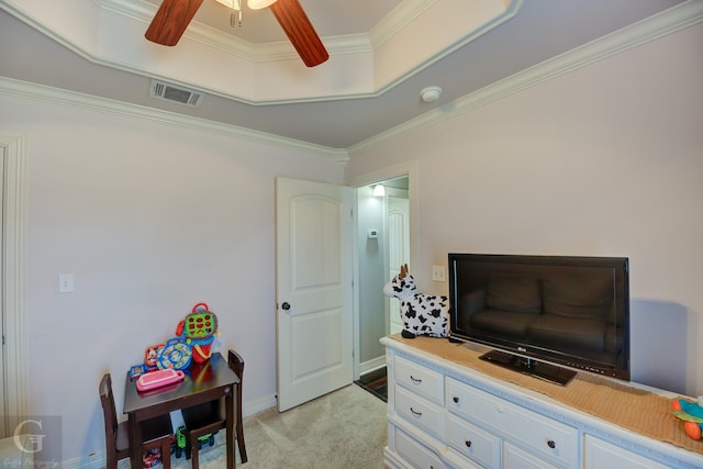 bedroom featuring ceiling fan, ornamental molding, and light carpet