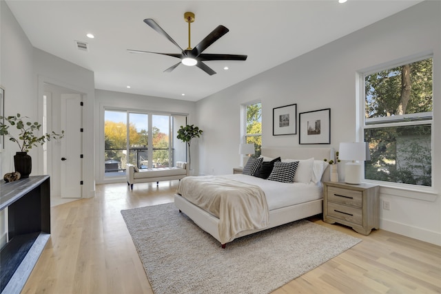 bedroom featuring ceiling fan and light hardwood / wood-style flooring