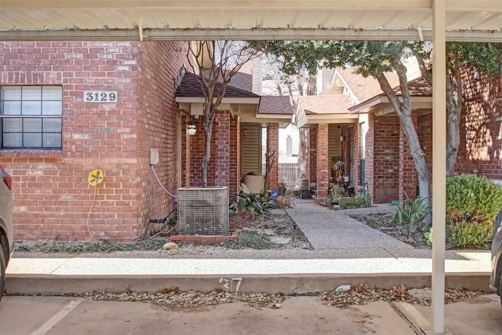 property entrance with cooling unit