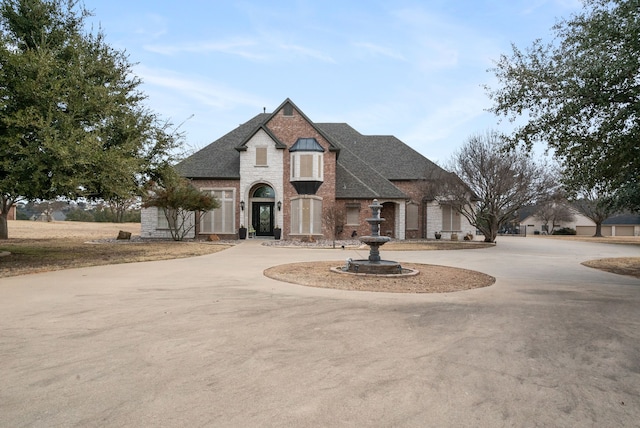 view of french country style house