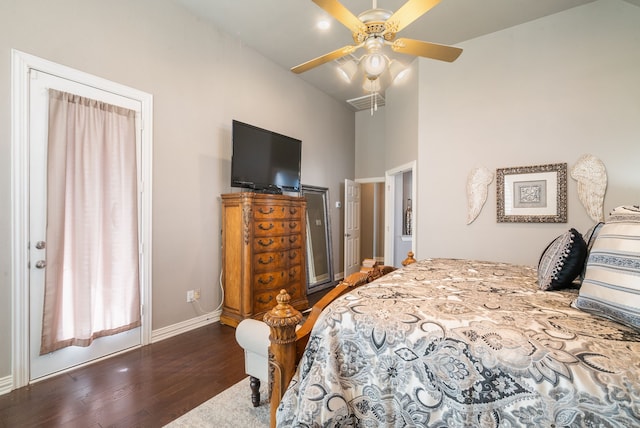 bedroom with ceiling fan and dark wood-type flooring