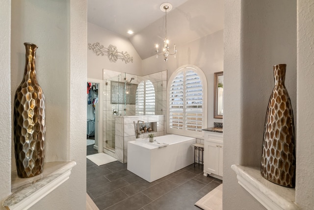 bathroom with lofted ceiling, tile patterned flooring, vanity, a chandelier, and independent shower and bath