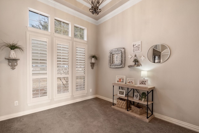 1901 Yucatan Dr, Granbury, TX 76048 - carpeted foyer with ornamental molding, baseboards, and a chandelier