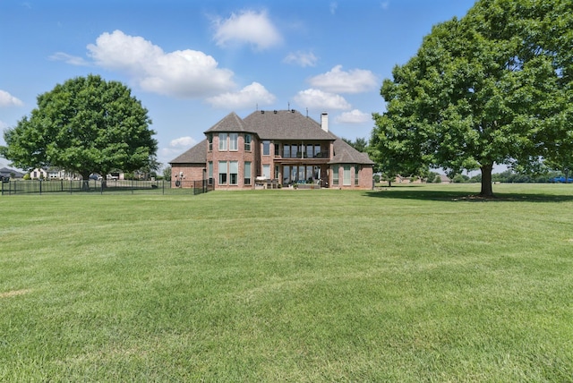 1901 Yucatan Dr, Granbury, TX 76048 - rear view of house featuring brick siding