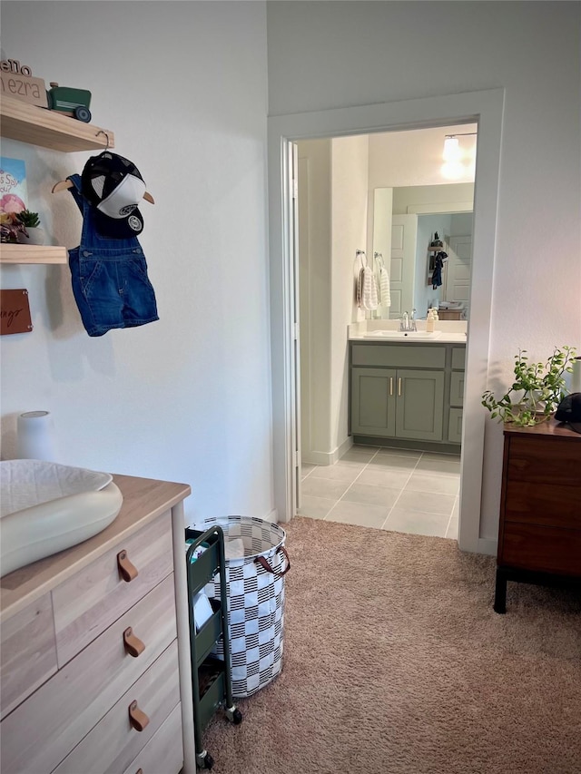 interior space with sink and light tile patterned floors