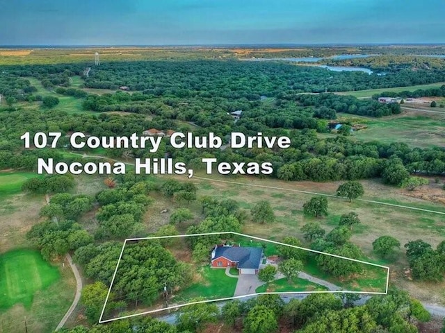 birds eye view of property featuring a rural view