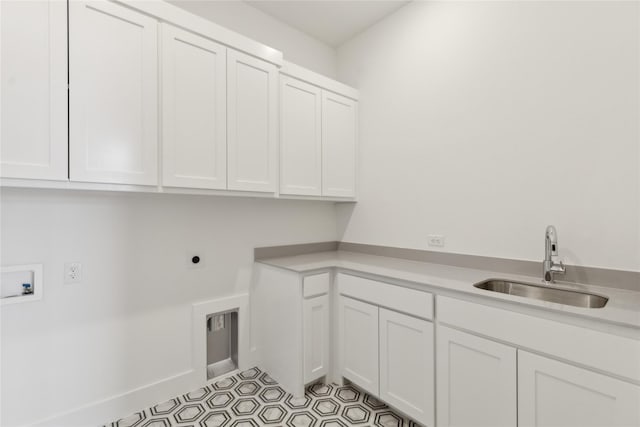 clothes washing area featuring light tile patterned floors, washer hookup, a sink, cabinet space, and electric dryer hookup