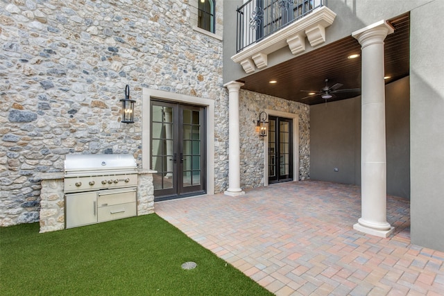 view of patio with ceiling fan, french doors, and area for grilling