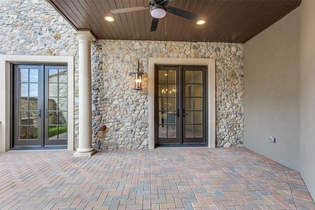 property entrance with ceiling fan, french doors, and a patio area