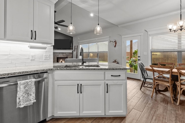 kitchen featuring sink, white cabinets, and stainless steel dishwasher