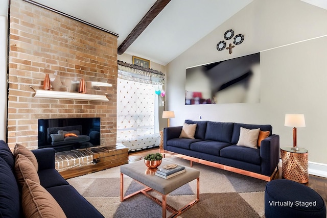 living room featuring a fireplace and vaulted ceiling with beams