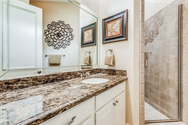 bathroom featuring vanity and walk in shower