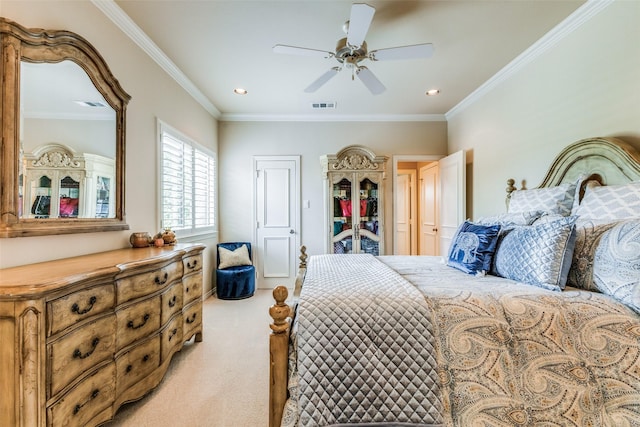 bedroom featuring light carpet, a closet, ceiling fan, and crown molding