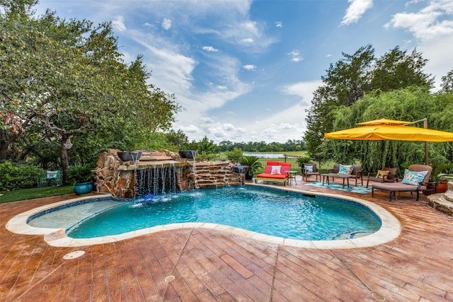 view of pool featuring a wooden deck and pool water feature